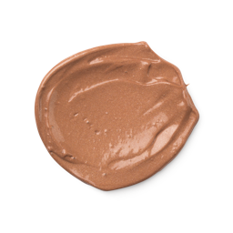 A swatch of slightly shimmery, rosy-bronze Charisma skin tint.