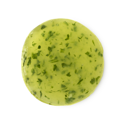 Cucumber Eye Pad. A bright, lime green, dewy, circular jelly-like eye mask, flecked with fresh cucumber skin.