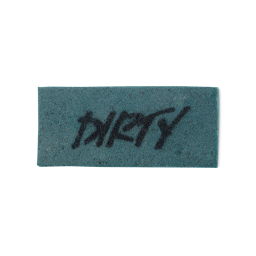 A teal blue, rectangular washcard, consisting of apple pulp, with 'Dirty' written across it in black Lush writing.