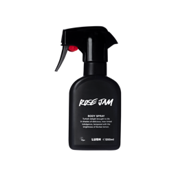 A spray bottle containing Rose Jam body spray, made of opaque black Lush plastic.